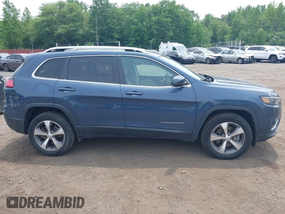 2020 Jeep Cherokee Limited with VIN 1C4PJMDX3LD603242, listed as a IAAI auction lot 42499494 with 51,491 mi miles and . Bid and sale history available at DreamBid. Image 13.