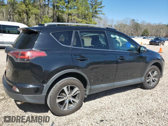 2018 Toyota RAV4 XLE with VIN 2T3WFREV7JW412348, listed as a Copart auction lot 49973215 with 127,661 mi miles and Salvage Title. Bid and sale history available at DreamBid. Image 3.