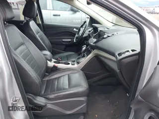 2013 Ford Escape SEL with VIN 1FMCU9H93DUD70670, listed as a IAAI auction lot 41867784 with 207,956 mi miles. Bid and sale history available at carsss.com. Image 5.