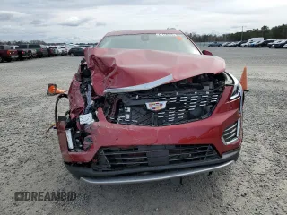 2022 Cadillac XT5 FWD Premium Luxury z VIN 1GYKNCRS9NZ130520, wystawiony jako Copart lot #47178275 z przebiegiem 8 564 mil mil oraz Szkoda całkowita • Salvage title. Historia ofert i sprzedaży dostępna na DreamBid. Obrazek 5.
