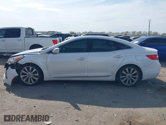 2015 Hyundai Azera Limited with VIN KMHFH4JG7FA476458, listed as a IAAI auction lot 41893979 with 149,114 mi miles and . Bid and sale history available at DreamBid. Image 14.