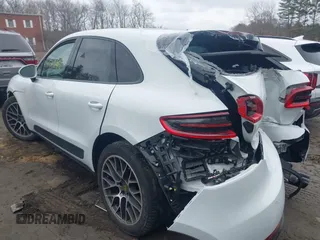 2018 Porsche Macan with VIN WP1AA2A56JLB18768, listed as a IAAI auction lot 41653261 with 56,993 mi miles. Bid and sale history available at carsss.com. Image 3.
