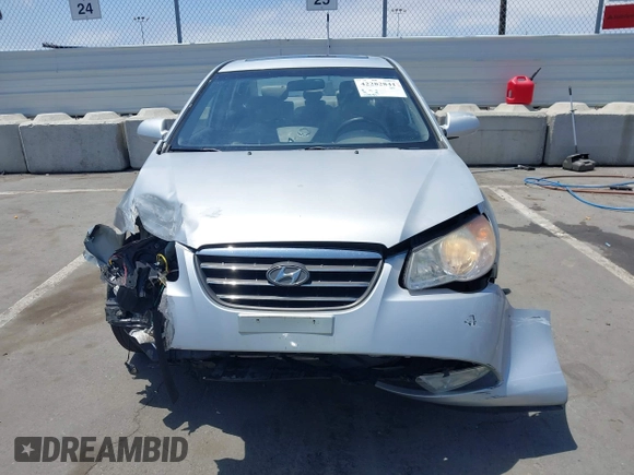 2009 Hyundai Elantra GLS z VIN KMHDU46D89U716718, wystawiony jako IAAI lot #42282841 z przebiegiem 130 843 mil mil oraz . Historia ofert i sprzedaży dostępna na DreamBid. Obrazek 12.