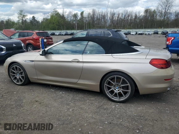 2012 BMW 6 Series 650i z VIN WBALZ3C52CC397545, wystawiony jako Copart lot #55976625 z przebiegiem 147 352 mil mil oraz Tytuł czysty. Historia ofert i sprzedaży dostępna na DreamBid. Obrazek 2.
