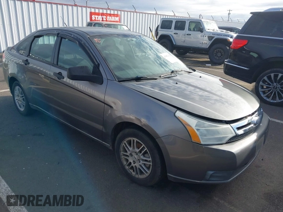 2010 Ford Focus SE with VIN 1FAHP3FN3AW243227, listed as a IAAI auction lot 41862142 with 264,713 mi miles. Bid and sale history available at carsss.com. Image 1.