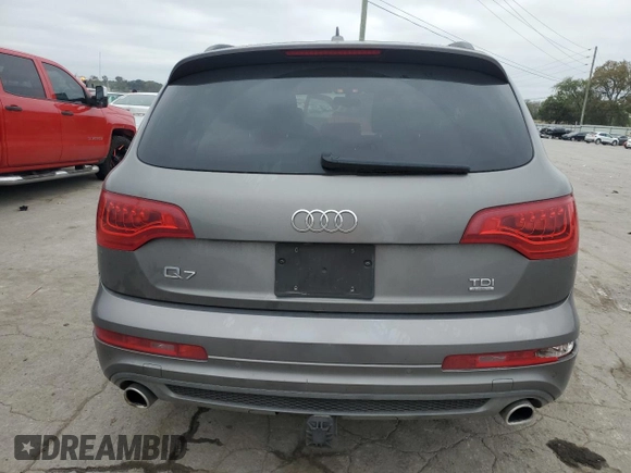 2014 Audi Q7 Prestige с VIN WA1WMAFE5ED015613, выставлен на аукционе Copart как лот 73987704 с пробегом 130 939 миль миль и Списание • Salvage title. История ставок и продаж доступна на DreamBid. Изображение 6.