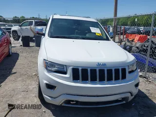 2015 Jeep Grand Cherokee Overland with VIN 1C4RJECG6FC707458, listed as a IAAI auction lot 41996350 with 128,307 mi miles and . Bid and sale history available at DreamBid. Image 12.