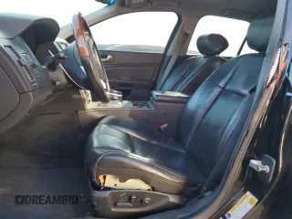 2009 Cadillac STS AWD with VIN 1G6DD67VX90137540, listed as a Copart auction lot 42062184 with 153,969 mi miles and Clean Title. Bid and sale history available at DreamBid. Image 7.