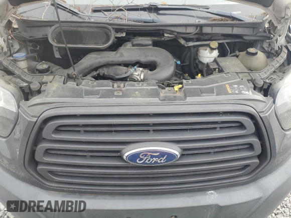 2017 Ford Transit z VIN 1FTYR2XM6HKA58420, wystawiony jako Copart lot #54891555 z przebiegiem 395 259 mil mil oraz Szkoda całkowita • Salvage title. Historia ofert i sprzedaży dostępna na DreamBid. Obrazek 12.