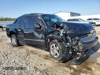 2012 Chevrolet Avalanche LTZ with VIN 3GNTKGE77CG133741, listed as a Copart auction lot 74483874 with 235,542 mi miles and Salvage Title. Bid and sale history available at DreamBid. Image 4.