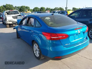 2016 Ford Focus SE with VIN 1FADP3F2XGL387131, listed as a IAAI auction lot 41992802 with 112,274 mi miles and . Bid and sale history available at DreamBid. Image 3.
