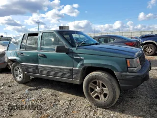 1993 Jeep Grand Cherokee Laredo with VIN 1J4GZ58S4PC580315, listed as a Copart auction lot 85105304 with 202,460 mi miles and Clean Title. Bid and sale history available at carsss.com. Image 4.