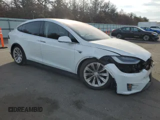 2016 Tesla Model X 70D z VIN 5YJXCBE27GF018468, wystawiony jako Copart lot #78384424 z przebiegiem 108 856 mil mil oraz Nie do naprawy • Non repairable. Historia ofert i sprzedaży dostępna na DreamBid. Obrazek 4.