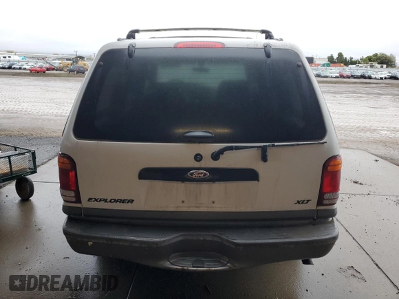 2000 Ford Explorer XLT z VIN 1FMZU73E2YZB82279, wystawiony jako Copart lot #86607864 z przebiegiem 46 620 mil mil oraz Szkody całkowita. Historia ofert i sprzedaży dostępna na DreamBid. Obrazek 6.