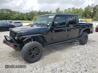 2023 Jeep Gladiator Sport S with VIN 1C6HJTAG9PL525183, listed as a Copart auction lot 54556735 with 13,805 mi miles and Salvage title. Bid and sale history available at DreamBid. Image 1.