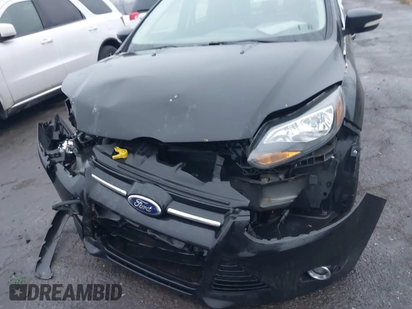 2014 Ford Focus Titanium with VIN 1FADP3J24EL439065, listed as a IAAI auction lot 40868973 with 167,739 mi miles. Bid and sale history available at carsss.com. Image 6.