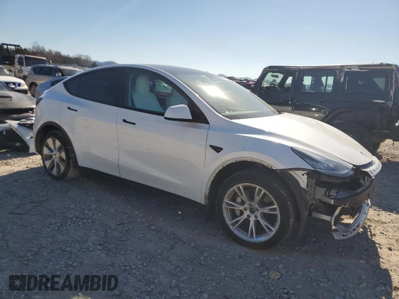 2022 Tesla Model Y Long Range z VIN 7SAYGDEE0NF339363, wystawiony jako Copart lot #44604015 z przebiegiem 48 002 mil mil oraz Szkody całkowita. Historia ofert i sprzedaży dostępna na DreamBid. Obrazek 4.