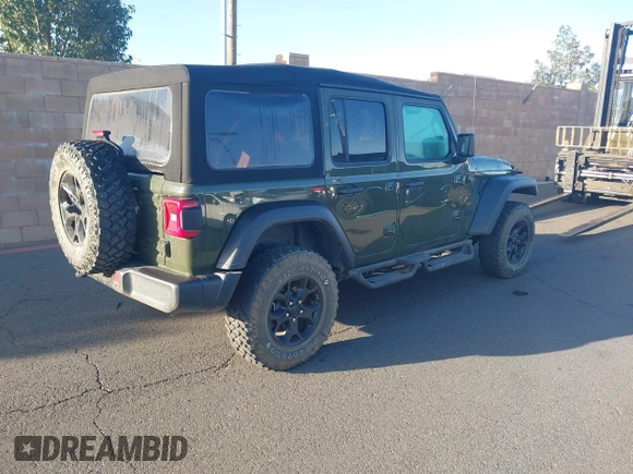2023 Jeep Wrangler Unlimited Willys Sport with VIN 1C4HJXDM0PW515898, listed as a IAAI auction lot 41419267 with 10,964 mi miles and . Bid and sale history available at DreamBid. Image 4.