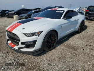2022 Ford Mustang Shelby GT500 z VIN 1FA6P8SJ3N5502995, wystawiony jako Copart lot #49130075 z przebiegiem 14 976 mil mil oraz Czysty tytuł • Clean title. Historia ofert i sprzedaży dostępna na DreamBid. Obrazek 1.