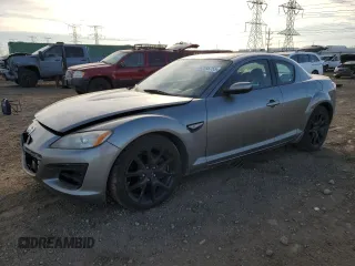 2009 Mazda RX-8 R3 with VIN JM1FE174290400312, listed as a Copart auction lot 42695755 with 87,355 mi miles and Salvage Title. Bid and sale history available at carsss.com. Image 1.