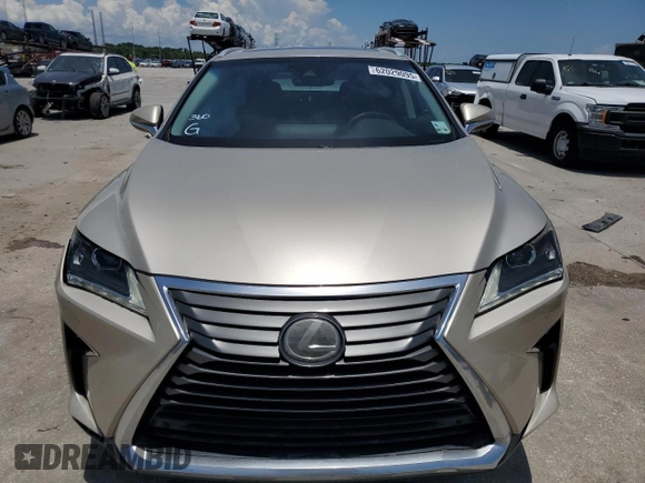 2016 Lexus RX 350 с VIN 2T2ZZMCA5GC027635, выставлен на аукционе Copart как лот 62029095 с пробегом 80 609 миль миль и Списание • Salvage title. История ставок и продаж доступна на DreamBid. Изображение 5.
