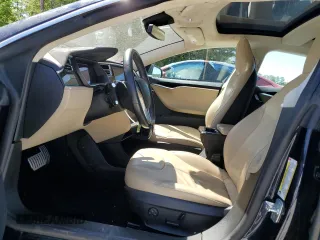 2014 Tesla Model S 60 with VIN 5YJSA1H10EFP52850, listed as a Copart auction lot 54321805 with 58,031 mi miles and Salvage Title. Bid and sale history available at DreamBid. Image 7.