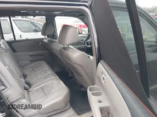 2009 Honda Pilot Touring with VIN 5FNYF48959B016978, listed as a IAAI auction lot 41947782 with 234,115 mi miles and . Bid and sale history available at carsss.com. Image 8.