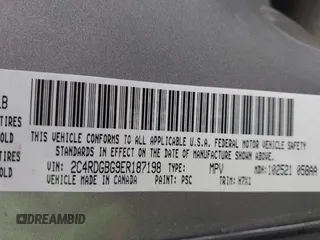 2014 Dodge Grand Caravan American Value with VIN 2C4RDGBG9ER187198, listed as a IAAI auction lot 41669334 with 204,803 mi miles and . Bid and sale history available at DreamBid. Image 9.