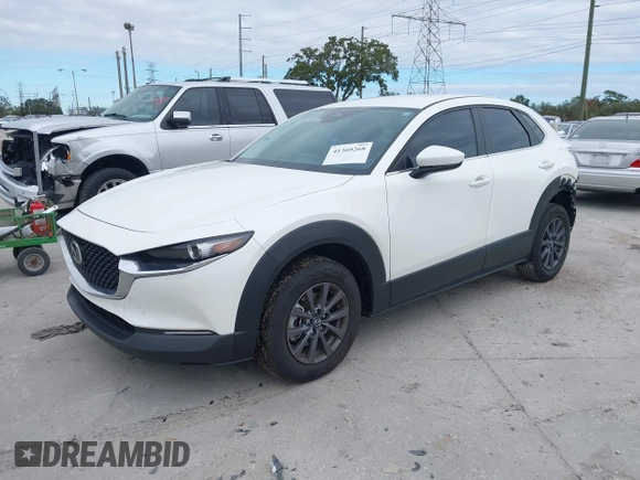 2024 Mazda CX-30 2.5 S with VIN 3MVDMBAMXRM610693, listed as a IAAI auction lot 41369268 with 60,842 mi miles. Bid and sale history available at carsss.com. Image 2.