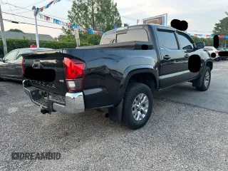 2019 Toyota Tacoma SR z VIN 3TMCZ5AN0KM203691, wystawiony jako Copart lot #60376205 z przebiegiem 218 516 mil mil oraz Czysty tytuł • Clean title. Historia ofert i sprzedaży dostępna na DreamBid. Obrazek 4.