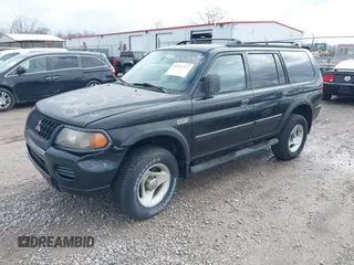 2000 Mitsubishi Montero Sport LS with VIN JA4LS31H0YP809623, listed as a IAAI auction lot 41821577 with 84,850 mi miles. Bid and sale history available at carsss.com. Image 2.