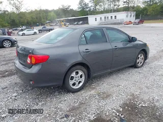 2009 Toyota Corolla with VIN JTDBL40E399032176, listed as a IAAI auction lot 42035968 with 213,062 mi miles. Bid and sale history available at carsss.com. Image 4.