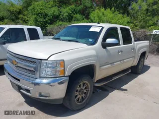 2012 Chevrolet Silverado 1500 LT with VIN 3GCPKSE73CG146306, listed as a IAAI auction lot 41997096 with 180,272 mi miles. Bid and sale history available at carsss.com. Image 2.