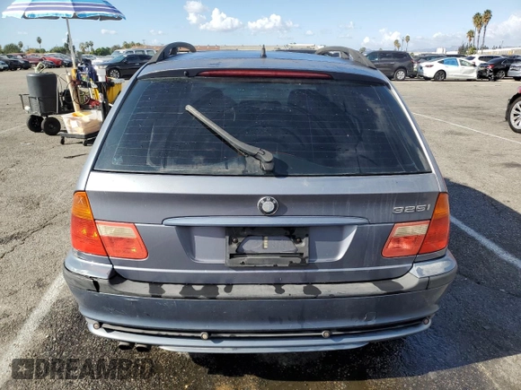 2003 BMW 3 Series 325i with VIN WBAEN33413PC12375, listed as a Copart auction lot 80742434 with 168,770 mi miles and Salvage Title. Bid and sale history available at carsss.com. Image 6.
