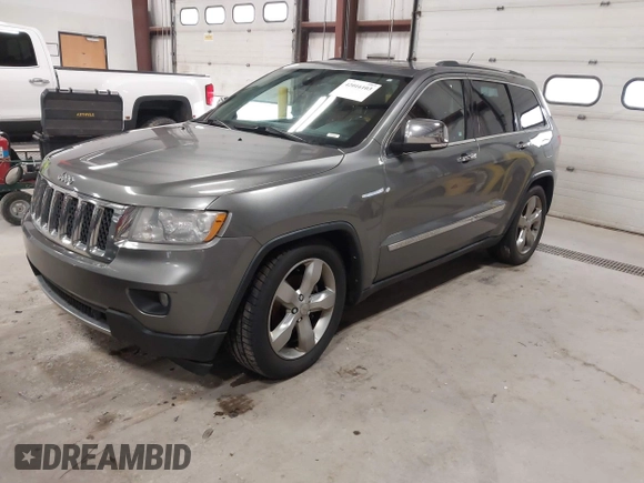 2013 Jeep Grand Cherokee Overland with VIN 1C4RJFCT9DC524605, listed as a IAAI auction lot 42016103 with 215,352 mi miles. Bid and sale history available at carsss.com. Image 17.