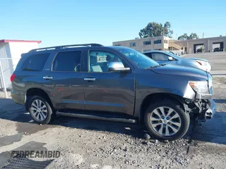 2016 Toyota Sequoia Limited with VIN 5TDJY5G16GS140022, listed as a IAAI auction lot 40995557 with 116,032 mi miles. Bid and sale history available at carsss.com. Image 13.