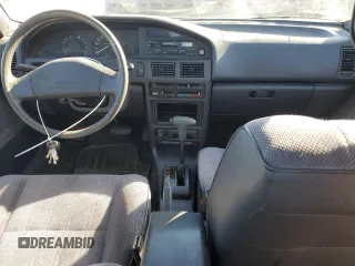 1992 Toyota Corolla z VIN JT2AE94A1N0300157, wystawiony jako Copart lot #77783474 z przebiegiem 180 103 mil mil oraz Czysty tytuł • Clean title. Historia ofert i sprzedaży dostępna na DreamBid. Obrazek 8.