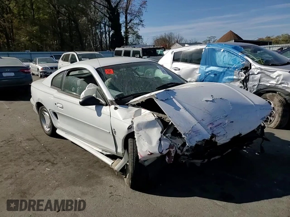 1997 Ford Mustang with VIN 1FALP4041VF194986, listed as a Copart auction lot 78841404 with 118,936 mi miles and Salvage Title. Bid and sale history available at carsss.com. Image 11.