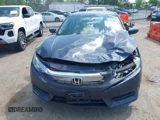 2018 Honda Civic LX with VIN 2HGFC2F53JH560402, listed as a IAAI auction lot 42152391 with 75,384 mi miles and . Bid and sale history available at DreamBid. Image 12.