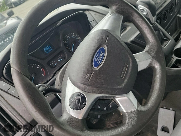 2016 Ford Transit Cargo z VIN 1FTYE1YM1GKB15643, wystawiony jako IAAI lot #42585640 z przebiegiem 301 257 mil mil oraz . Historia ofert i sprzedaży dostępna na DreamBid. Obrazek 23.