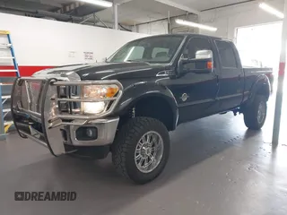 2015 Ford Super Duty F-250 SRW Lariat with VIN 1FT7W2BT1FED13599, listed as a IAAI auction lot 41987618 with 174,728 mi miles. Bid and sale history available at carsss.com. Image 2.