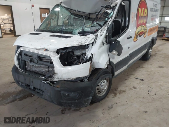 2020 Ford Transit Cargo z VIN 1FTBR2C81LKA68599, wystawiony jako IAAI lot #41381157 z przebiegiem 63 382 mil mil oraz . Historia ofert i sprzedaży dostępna na DreamBid. Obrazek 17.