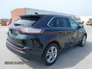 2015 Ford Edge Titanium z VIN 2FMTK3K87FBC06852, wystawiony jako IAAI lot #42335238 z przebiegiem 187 256 mil mil oraz . Historia ofert i sprzedaży dostępna na DreamBid. Obrazek 4.