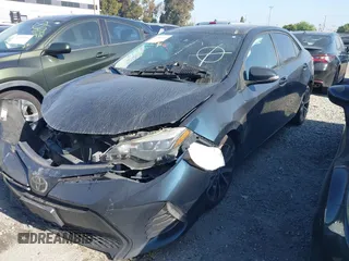 2019 Toyota Corolla L with VIN 2T1BURHE3KC137878, listed as a IAAI auction lot 41861012 with 145,668 mi miles and . Bid and sale history available at DreamBid. Image 2.