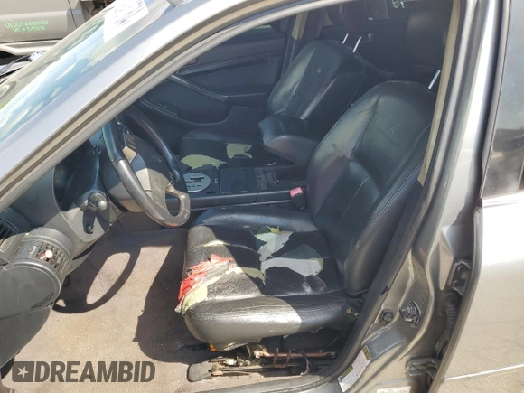 2004 Infiniti G35 w/Leather with VIN JNKCV51F04M716151, listed as a Copart auction lot 72945784 with 199,371 mi miles and Salvage Title. Bid and sale history available at DreamBid. Image 7.