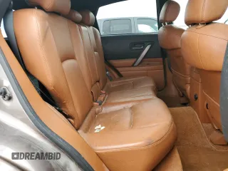 2003 Infiniti FX Options z VIN JNRAS08W03X202372, wystawiony jako Copart lot #46626995 z przebiegiem 124 061 mil mil oraz Szkoda całkowita • Salvage title. Historia ofert i sprzedaży dostępna na DreamBid. Obrazek 11.
