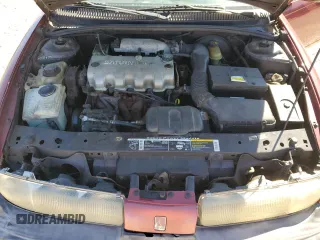 1998 Saturn SL z VIN 1G8ZH528XWZ144301, wystawiony jako Copart lot #75918414 z przebiegiem 219 256 mil mil oraz Szkoda całkowita • Salvage title. Historia ofert i sprzedaży dostępna na DreamBid. Obrazek 13.