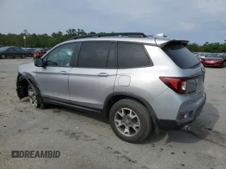 2022 Honda Passport TrailSport с VIN 5FNYF8H6XNB000430, выставлен на аукционе Copart как лот 57021055 с пробегом 96 503 миль миль и Списание • Salvage title. История ставок и продаж доступна на DreamBid. Изображение 2.
