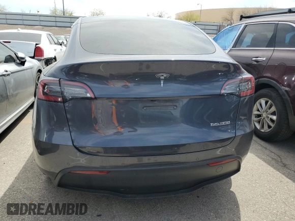2022 Tesla Model Y Performance with VIN 7SAYGDEF1NF491967, listed as a Copart auction lot 51119515 with 50,520 mi miles and Salvage title. Bid and sale history available at DreamBid. Image 6.