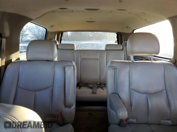 2004 GMC Yukon XL SLT with VIN 1GKEC16Z74J128281, listed as a Copart auction lot 72756074 with 0 mi miles and Salvage Title. Bid and sale history available at carsss.com. Image 10.